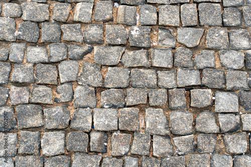 Gray stone background, stone paving slabs, paving stone pattern