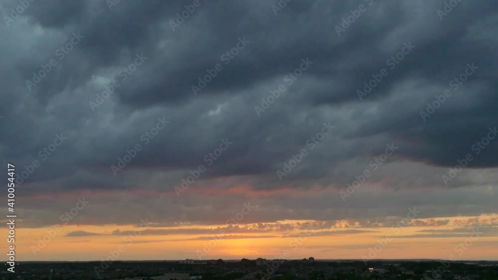 Sunset time-lapse with dramatic clouds and golden sun Sunset time-lapse with dramatic clouds and golden sun