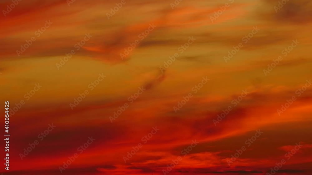 Time-lapse of clouds at sunset with vivid colors Time-lapse of clouds at sunset with vivid colors