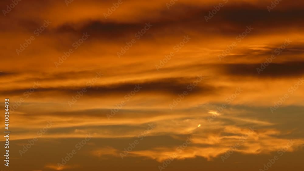 Wonderful time-lapse of clouds moving across sky at sunset. Wonderful time-lapse of clouds moving across sky at sunset.