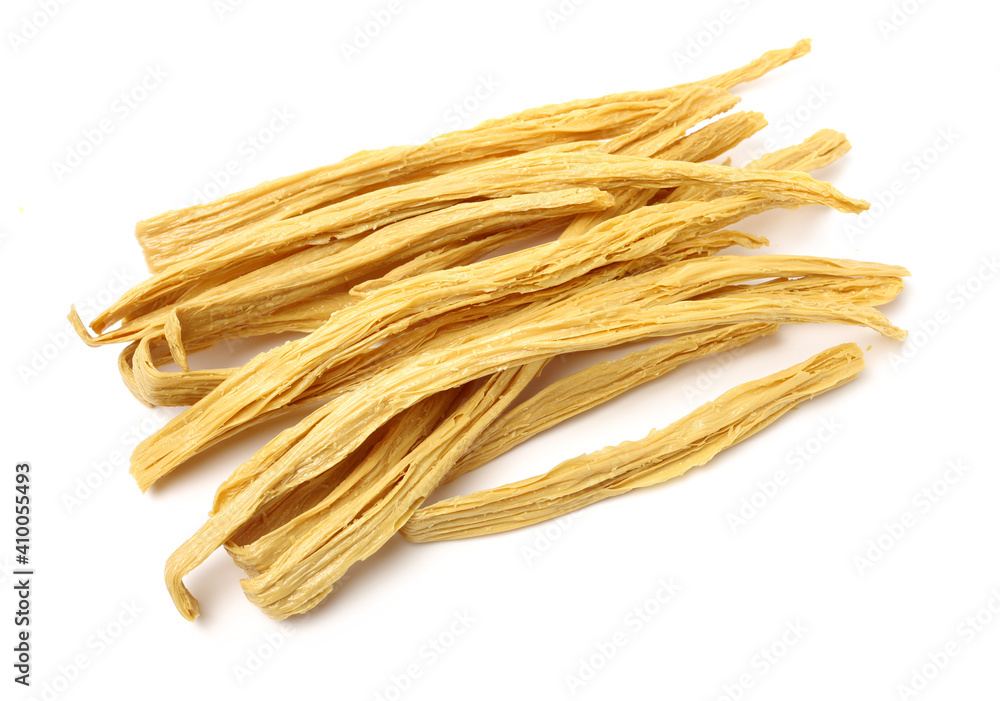 Dried yuba sticks or Fuzhu on white background Dried yuba sticks or Fuzhu on white background
