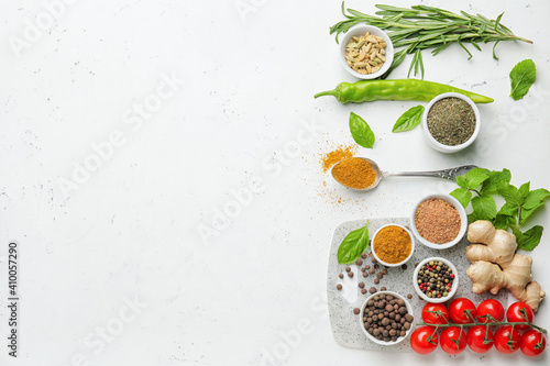 Wallpaper Mural Composition with different spices and herbs on light background Torontodigital.ca