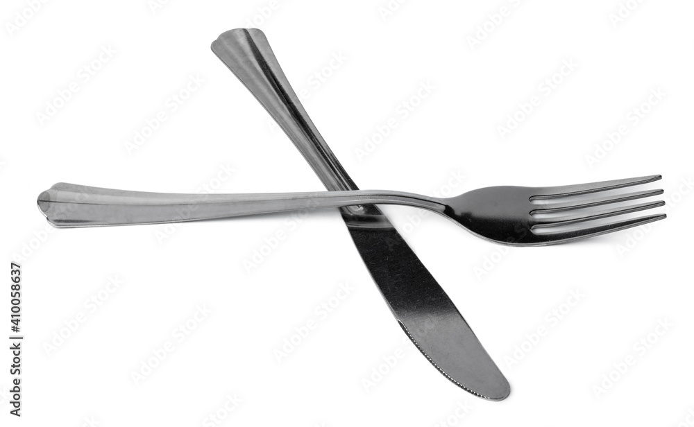 Silver fork and knife isolated on white background Silver fork and knife isolated on white background