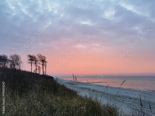Sunset at a natural beach at the Baltic Sea in Germany  close to the city oft Rostock