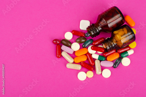 Disease and treatment. Medicine concept. Medication and packaging on bright background. Studio Photo
