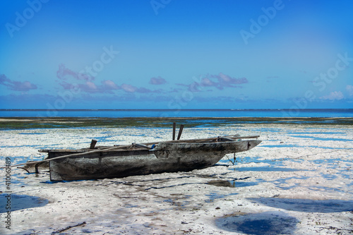 Old wooden fishing boat in the Indian ocean off the coast of Zanzibar