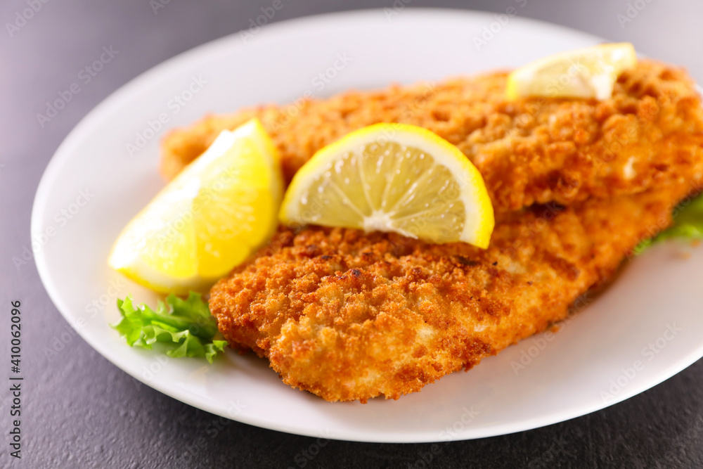 crispy breaded fish fillet and lemon crispy breaded fish fillet and lemon