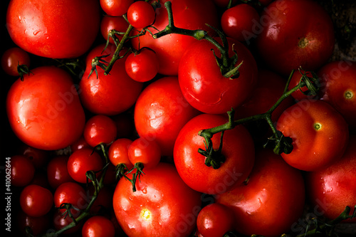 Fresh small red tomatoes background