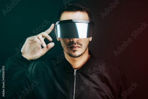 Man wearing black shield glasses