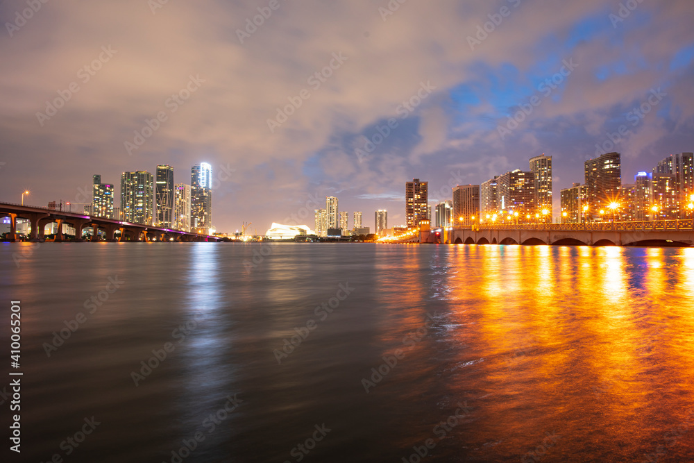 Night Florida Miami city skyline. USA skyscrappers downtown. Landscape of twighlight town.