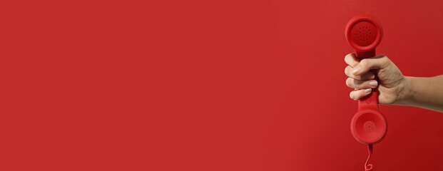 Hotline service. Woman with telephone receiver and space for text on red background, banner design