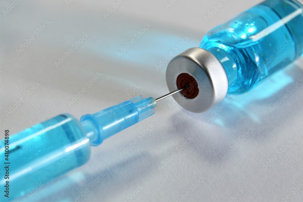 syringe on blue