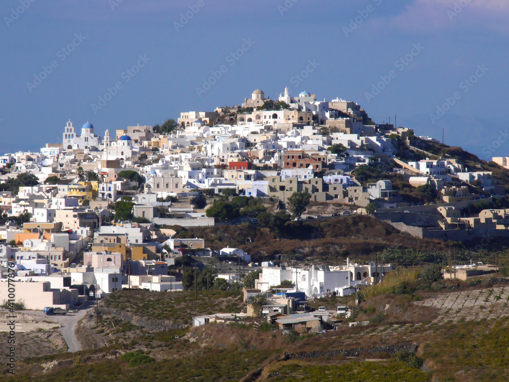 View of the central historical part of Pyrgos town on Santorini island, Greece.