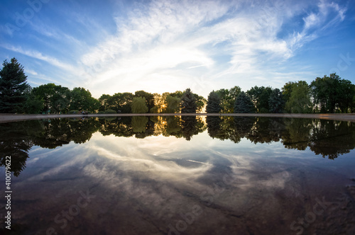 Beautiful round pond at sunset