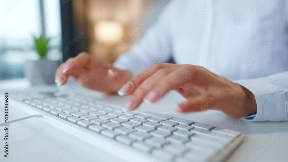 Female hands typing on a computer keyboard. Concept of remote work. Female hands typing on a computer keyboard. Concept of remote work.