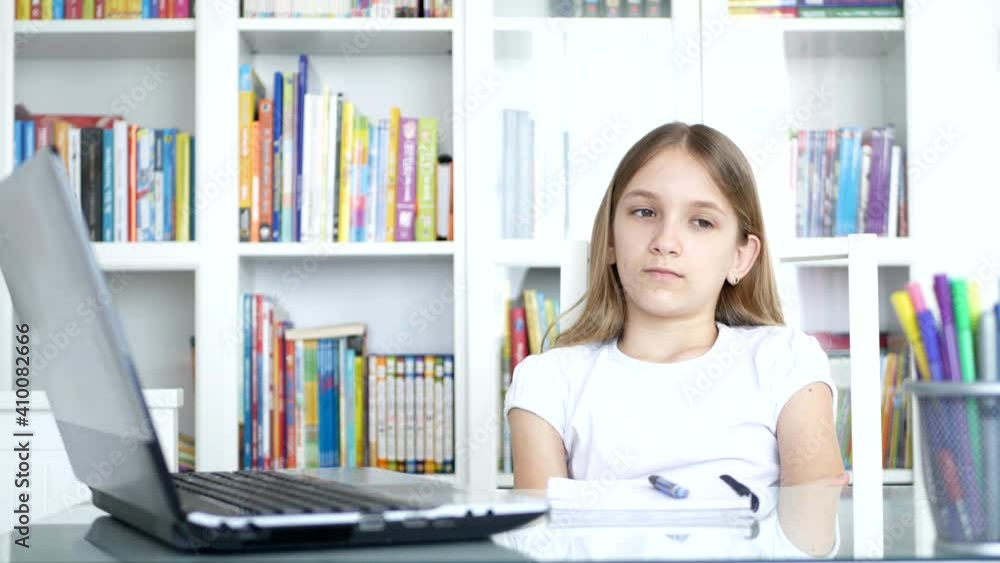 Bored Kid Studying for School, Tired Child at Study Office, Student Girl Doing Homework, Online Education in Pandemic Crises Bored Kid Studying for School, Tired Child at Study Office, Student Girl Doing Homework, Online Education in Pandemic Crises