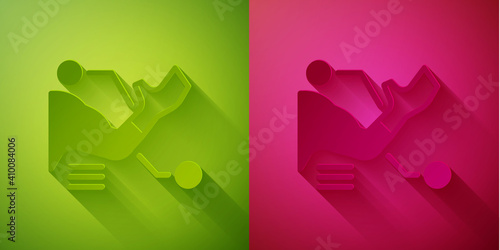 Paper cut Prosthesis hand icon isolated on green and pink background. Futuristic concept of bionic arm, robotic mechanical hand. Paper art style. Vector.
