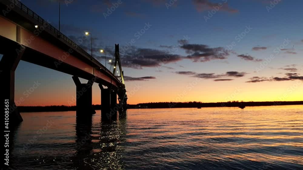 Replot bridge in beautiful orange sunset scene with evening blue sky Replot bridge in beautiful orange sunset scene with evening blue sky