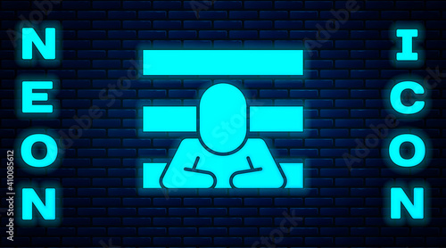 Glowing neon Prisoner icon isolated on brick wall background. Vector.