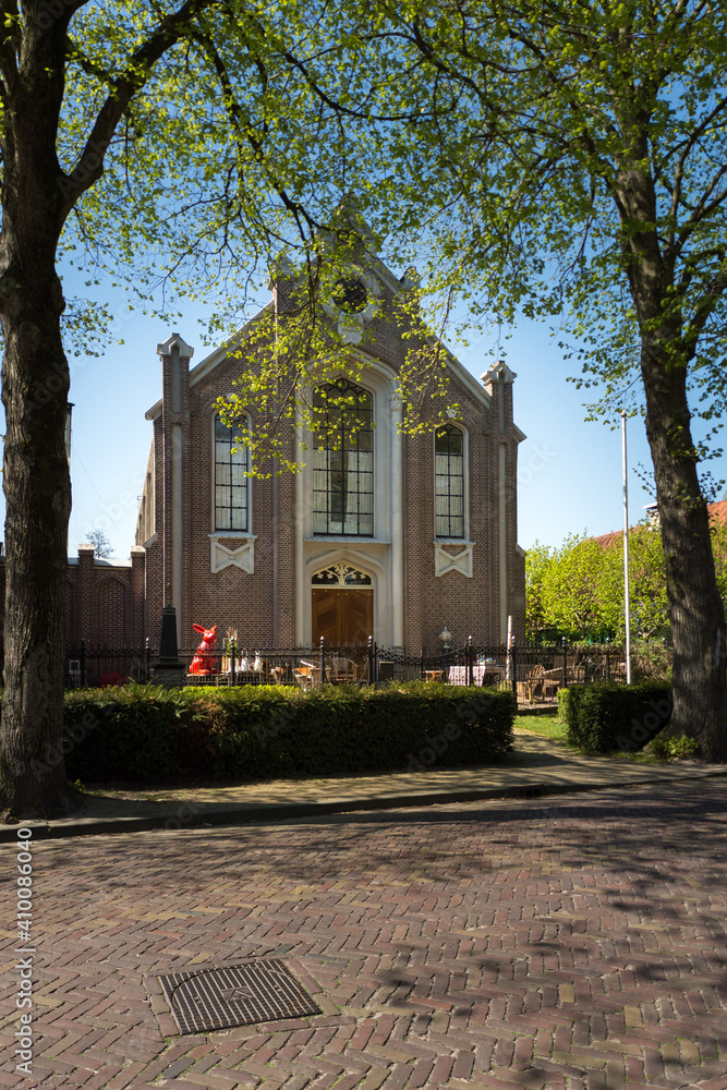 Mennonites Church (Doopsgezinde Kerk) in Terherne, Netherlands, have Easter decorations in its front yard 