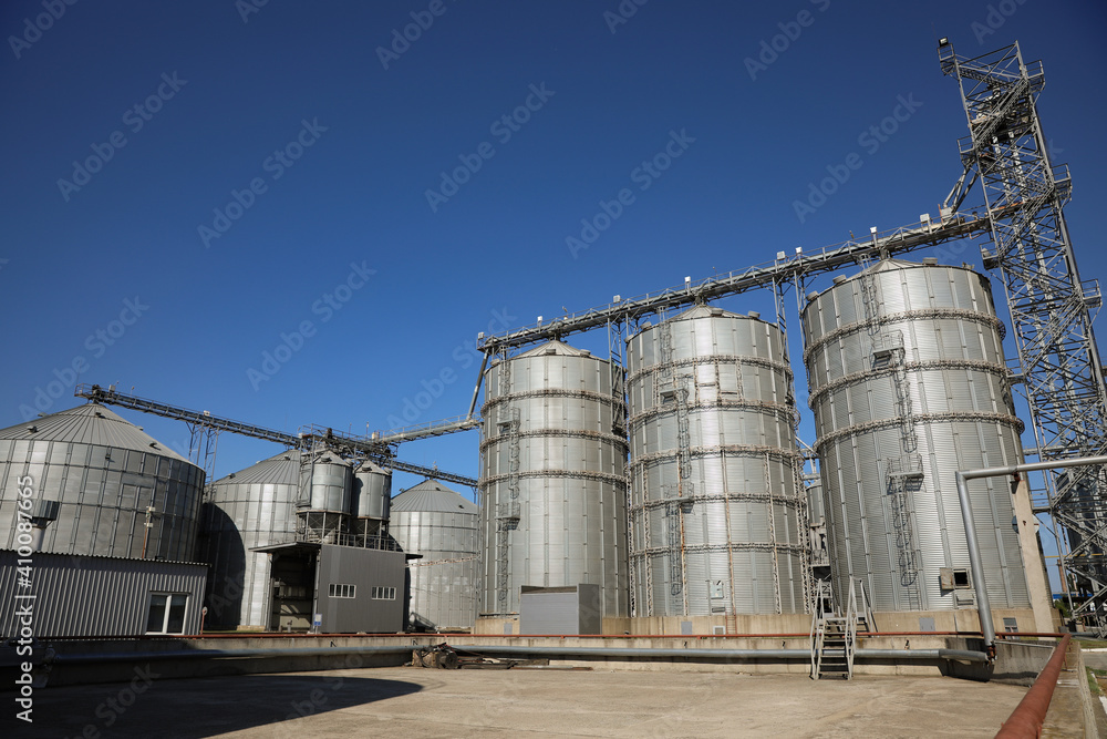 View of modern granaries for storing cereal grains outdoors View of modern granaries for storing cereal grains outdoors