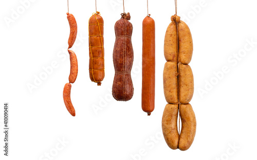 Several types of smoked sausage on a white background