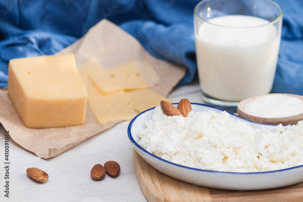 Assortment of dairy milk prodacts cheese, milk, creame, cottage cheese. Nature organic products concept. Assortment of dairy milk prodacts cheese, milk, creame, cottage cheese. Nature organic products concept.