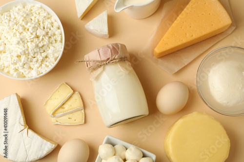 Valokuva Different fresh dairy products on beige background, top view