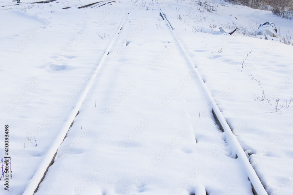 snow-covered rails