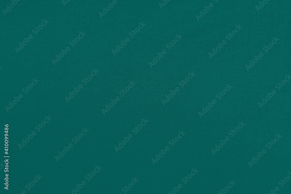 Fototapeta premium Green homogeneous background with a textured surface
