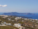 View of Santorini island, sea, mountains and cities from the top of Pyrgos town.