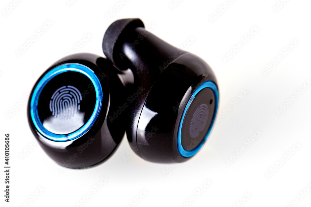 Wireless headphones on a white background. Wireless headset closeup isolated on white background. Wireless headphones on a white background. Wireless headset closeup isolated on white background.