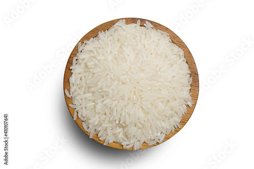 Healthy food. A wooden bowl of rice on a white background. Top view, high resolution product copy area