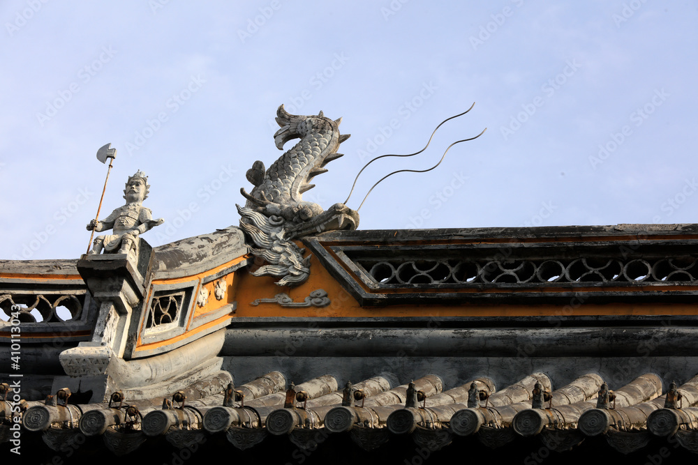 The sculpture on the roof ridge is in Chenxiang Pavilion, Shanghai, China