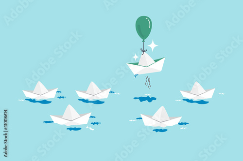 Think different, innovation to change from routine traditional thinking concept, stand out origami paper boat flying with air balloon in different path instead of follow others.
