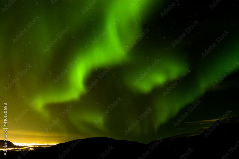 aurora borealis above the mountains, Iceland
