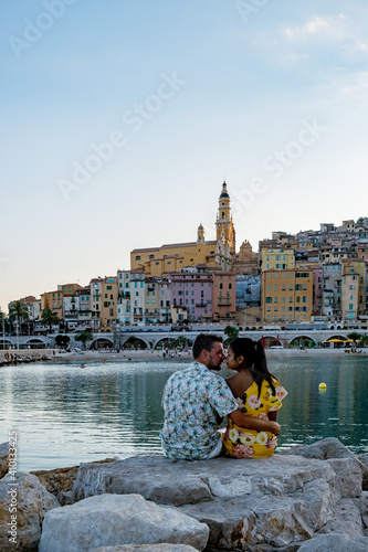 View on old part of Menton, Provence-Alpes-Cote d'Azur, France Europe during summer, couple men and woman on vacation at Menton France photo