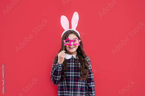 pure happiness. adorable kid wearing funny hare ears. easter spring holiday. happy teen girl