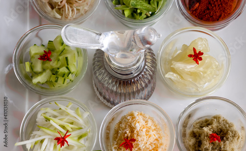 Southern Thai style fruits and vegetables salad or Khao Yam placed on fine crystal wares.