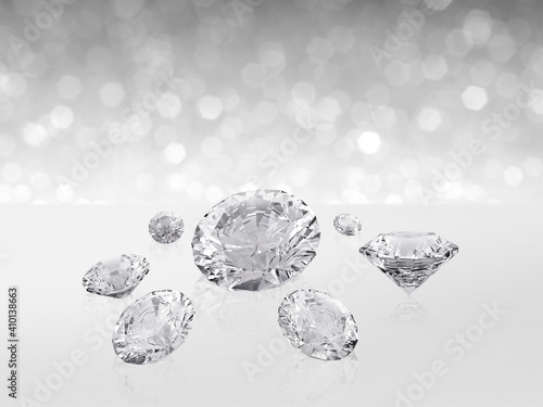 Group of diamonds placed on white background on the right with bokeh. 3D render