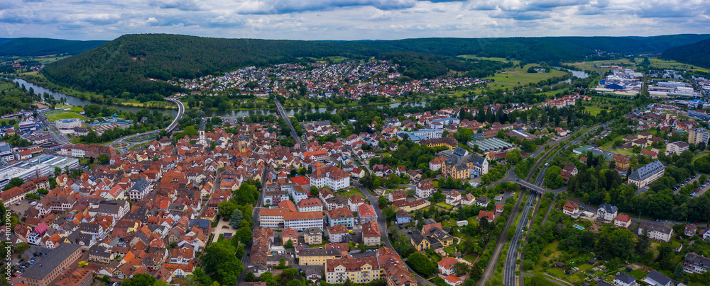 Aerial view of the old town of the city Lohr am Main in Germany on sunny day in spring.	
