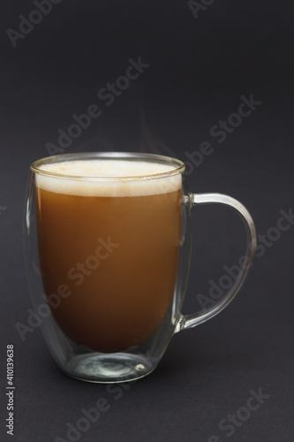 Glass Cup of coffee latte on dark