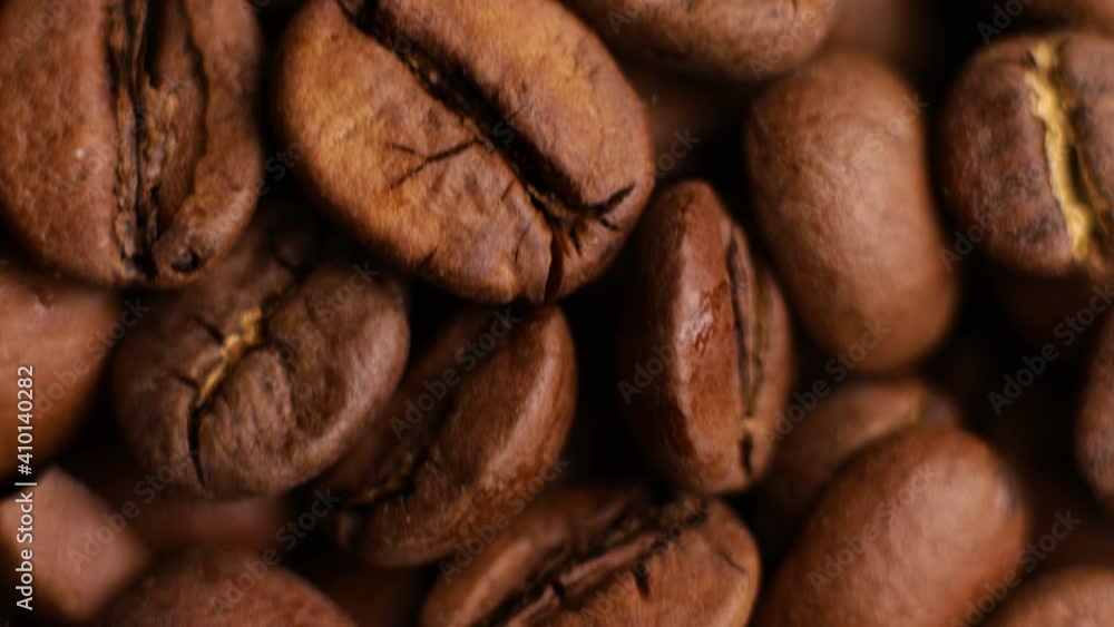 fresh roasted coffee beans background (dolly shot) fresh roasted coffee beans background (dolly shot)