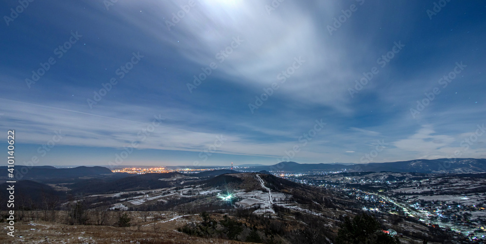 Night view of village in mountains during winter Night view of village in mountains during winter