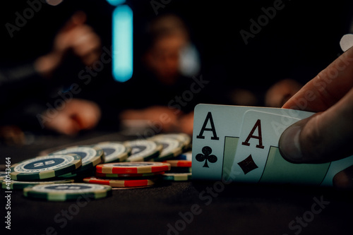 the poker game in casino chips cards and the poker table