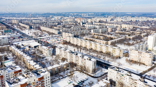 Winter aerial view to residential area Saltivka in Kharkiv, Ukraine. Yuvilejnyj Avenue and microdistricts photo