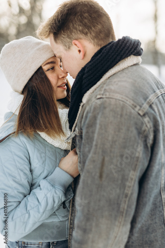 A couple walks in the winter. Couple in love. Snow. Winter. © Ксения Пальчик