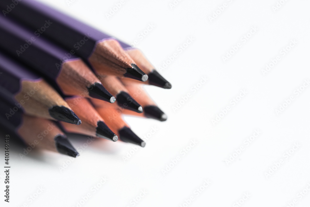 Violet pencils on a white background. Office, drawing. Violet pencils on a white background. Office, drawing.