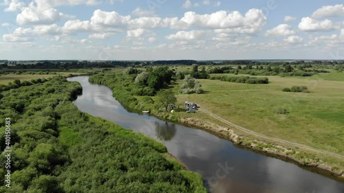 Scenic aerial view of the river field forest 