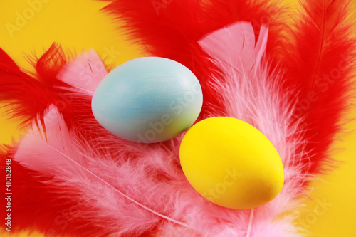 colorful easter eggs in feathers